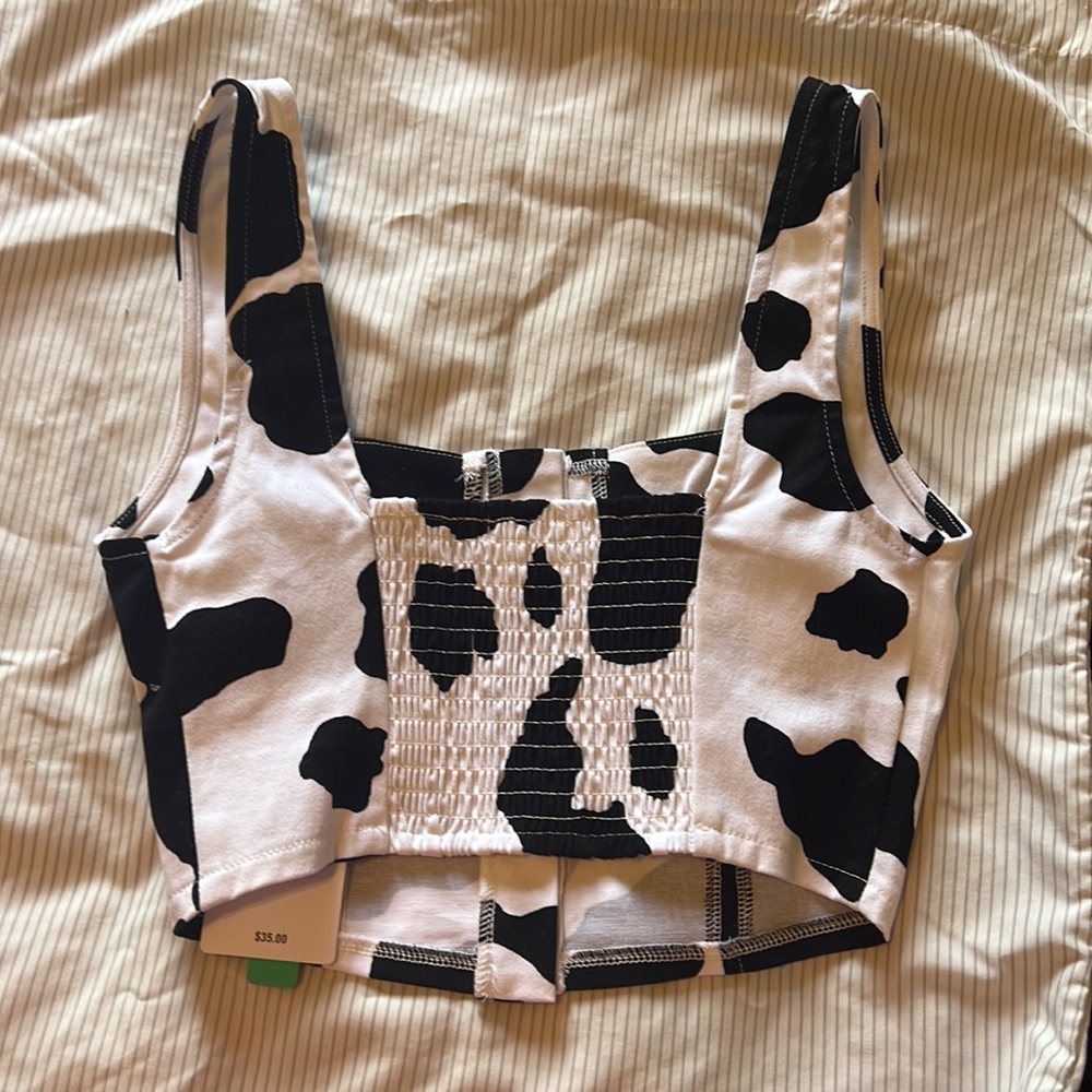 Stitch and pine cow print tank top! Size xs